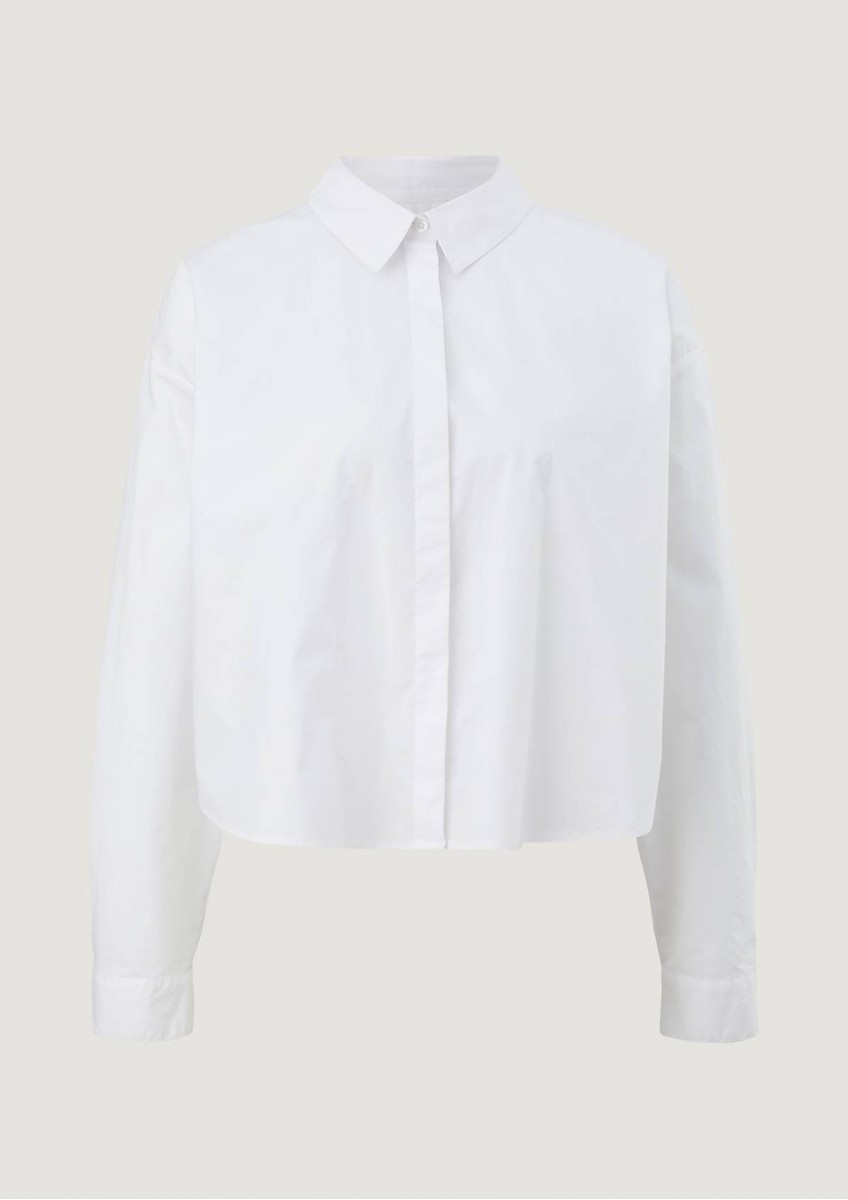 Женская белая блузка свободного кроя