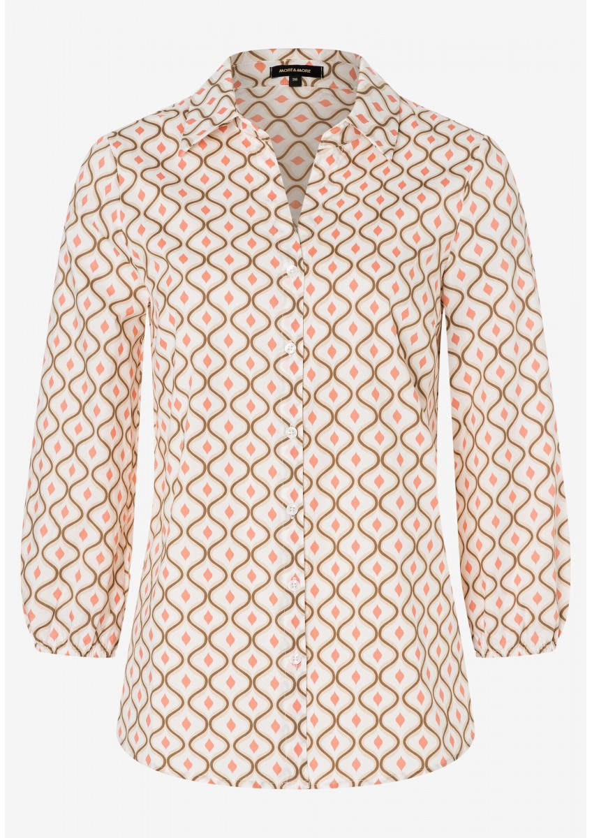 Женская светло-бежевая блузка с графическим принтом
