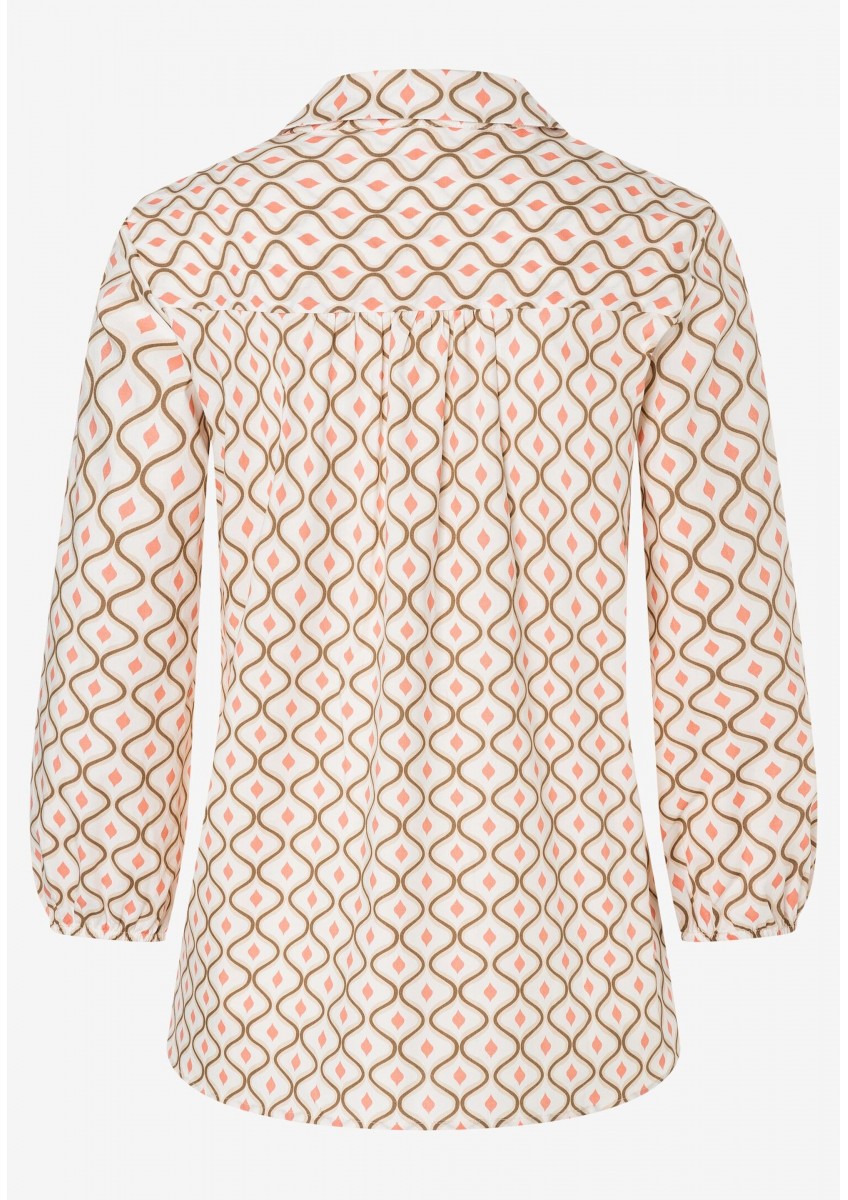 Женская светло-бежевая блузка с графическим принтом
